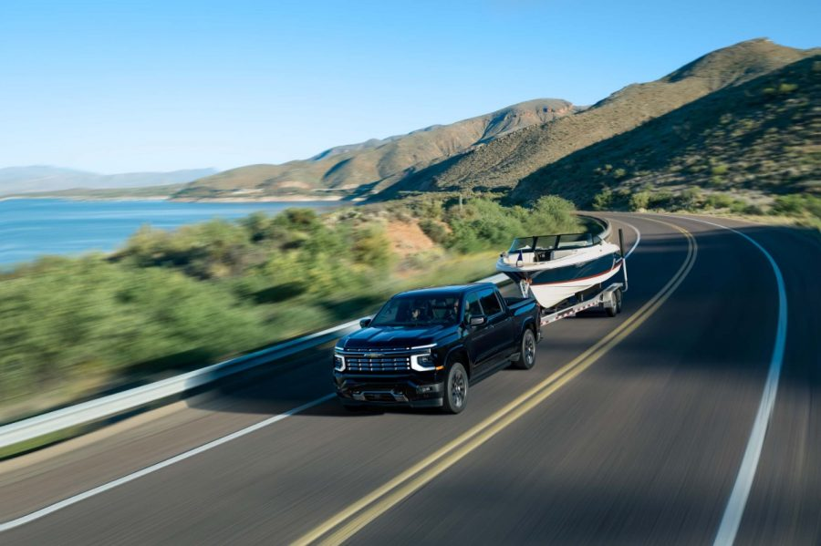 2027 Chevrolet Silverado 1500 towing a boat